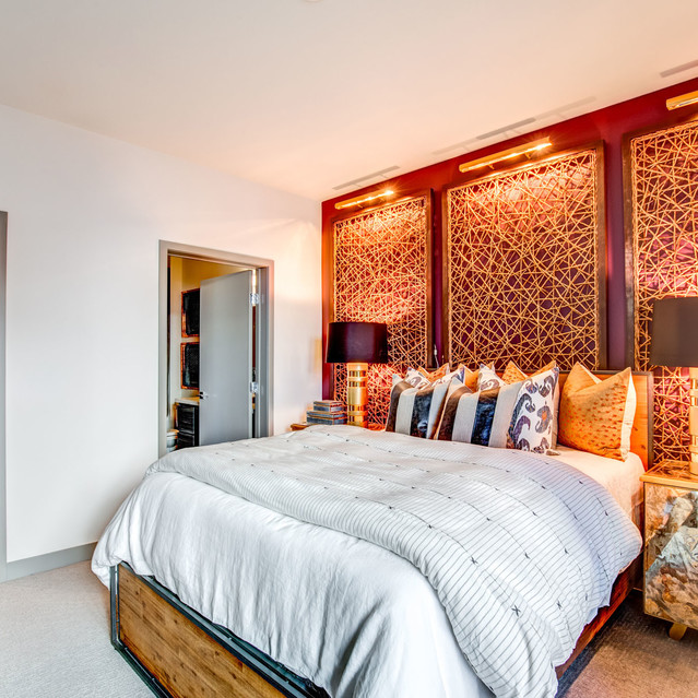 Douglas at Stonelake - Bedroom with Patterned Headboard and Warm Lighting