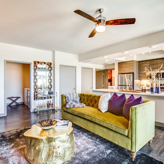 Douglas at Stonelake - Open-Concept Living Space with Plush Sofa and Ceiling Fan
